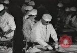 Image of workers in butchery United States USA, 1919, second 27 stock footage video 65675063931