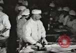 Image of workers in butchery United States USA, 1919, second 28 stock footage video 65675063931