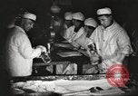Image of workers in butchery United States USA, 1919, second 33 stock footage video 65675063931