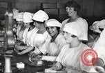 Image of workers in butchery United States USA, 1919, second 38 stock footage video 65675063931