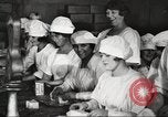 Image of workers in butchery United States USA, 1919, second 43 stock footage video 65675063931