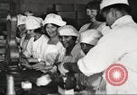 Image of workers in butchery United States USA, 1919, second 44 stock footage video 65675063931