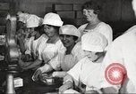 Image of workers in butchery United States USA, 1919, second 47 stock footage video 65675063931