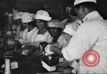 Image of workers in butchery United States USA, 1919, second 49 stock footage video 65675063931