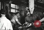 Image of workers in butchery United States USA, 1919, second 8 stock footage video 65675063932