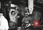 Image of workers in butchery United States USA, 1919, second 10 stock footage video 65675063932