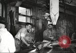Image of workers in butchery United States USA, 1919, second 11 stock footage video 65675063932
