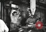 Image of workers in butchery United States USA, 1919, second 13 stock footage video 65675063932