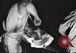 Image of workers in butchery United States USA, 1919, second 15 stock footage video 65675063932