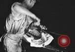 Image of workers in butchery United States USA, 1919, second 18 stock footage video 65675063932