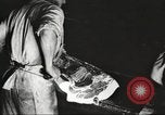 Image of workers in butchery United States USA, 1919, second 19 stock footage video 65675063932