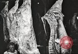 Image of workers in butchery United States USA, 1919, second 25 stock footage video 65675063932