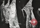 Image of workers in butchery United States USA, 1919, second 28 stock footage video 65675063932