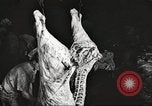 Image of workers in butchery United States USA, 1919, second 4 stock footage video 65675063935
