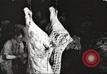 Image of workers in butchery United States USA, 1919, second 7 stock footage video 65675063935