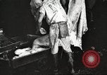 Image of workers in butchery United States USA, 1919, second 17 stock footage video 65675063935