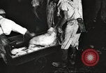 Image of workers in butchery United States USA, 1919, second 18 stock footage video 65675063935