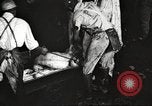Image of workers in butchery United States USA, 1919, second 19 stock footage video 65675063935