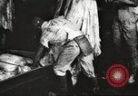 Image of workers in butchery United States USA, 1919, second 21 stock footage video 65675063935