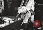 Image of workers in butchery United States USA, 1919, second 23 stock footage video 65675063935