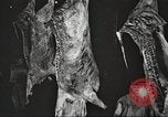 Image of workers in butchery United States USA, 1919, second 28 stock footage video 65675063935