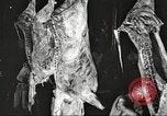 Image of workers in butchery United States USA, 1919, second 33 stock footage video 65675063935