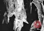 Image of workers in butchery United States USA, 1919, second 35 stock footage video 65675063935