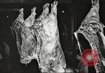 Image of workers in butchery United States USA, 1919, second 37 stock footage video 65675063935