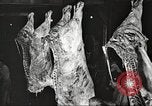 Image of workers in butchery United States USA, 1919, second 38 stock footage video 65675063935