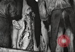 Image of workers in butchery United States USA, 1919, second 53 stock footage video 65675063935