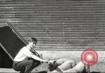 Image of workers in barn United States USA, 1920, second 5 stock footage video 65675063942