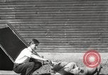 Image of workers in barn United States USA, 1920, second 6 stock footage video 65675063942
