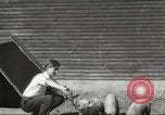 Image of workers in barn United States USA, 1920, second 7 stock footage video 65675063942