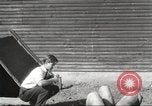 Image of workers in barn United States USA, 1920, second 9 stock footage video 65675063942