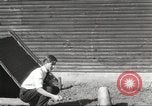 Image of workers in barn United States USA, 1920, second 10 stock footage video 65675063942