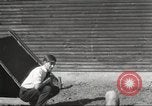 Image of workers in barn United States USA, 1920, second 11 stock footage video 65675063942