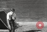 Image of workers in barn United States USA, 1920, second 13 stock footage video 65675063942