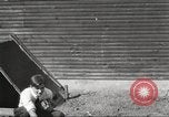 Image of workers in barn United States USA, 1920, second 14 stock footage video 65675063942