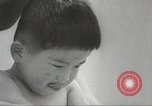 Immagine di Bambini giapponesi nuotare Tokyo Giappone, 1967, secondo 12 filmato di repertorio 65675063956