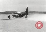 Image of First flight of Bell YP-59A jet airplane United States USA, 1942, second 14 stock footage video 65675063985