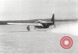 Image of First flight of Bell YP-59A jet airplane United States USA, 1942, second 15 stock footage video 65675063985