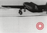 Image of First flight of Bell YP-59A jet airplane United States USA, 1942, second 22 stock footage video 65675063985