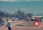 Image of traffic on road Vietnam, 1965, second 16 stock footage video 65675064025
