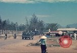 Image of traffic on road Vietnam, 1965, second 19 stock footage video 65675064025