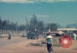 Image of traffic on road Vietnam, 1965, second 20 stock footage video 65675064025