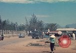 Image of traffic on road Vietnam, 1965, second 21 stock footage video 65675064025