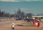 Image of traffic on road Vietnam, 1965, second 26 stock footage video 65675064025