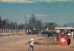 Image of traffic on road Vietnam, 1965, second 27 stock footage video 65675064025