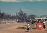 Image of traffic on road Vietnam, 1965, second 29 stock footage video 65675064025