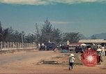 Image of traffic on road Vietnam, 1965, second 30 stock footage video 65675064025